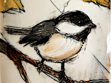 Chicadee on mug, close up